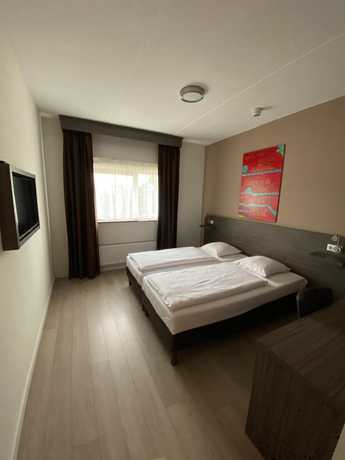 Imagen de la habitación del Hotel de Keizerskroon, Halfweg. Foto 13