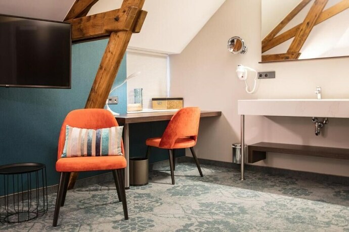 Imagen de la habitación del Hotel de Koppelpaarden. Foto 18