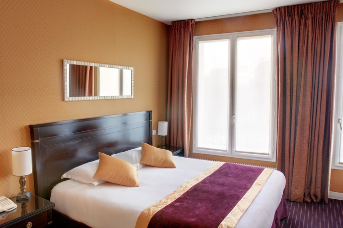 Imagen de la habitación del Hotel de Neuville Arc de Triomphe. Foto 9