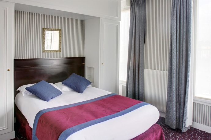 Imagen de la habitación del Hotel de Neuville Arc de Triomphe. Foto 11