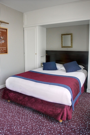 Imagen de la habitación del Hotel de Neuville Arc de Triomphe. Foto 12