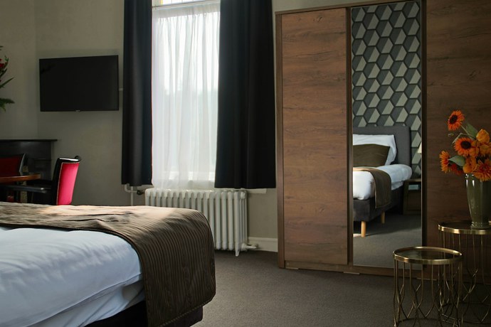 Imagen de la habitación del Hotel de Roode Leeuw. Foto 2