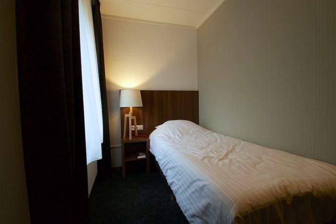 Imagen de la habitación del Hotel de Roode Leeuw. Foto 4