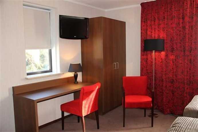 Imagen de la habitación del Hotel de Roode Leeuw. Foto 8