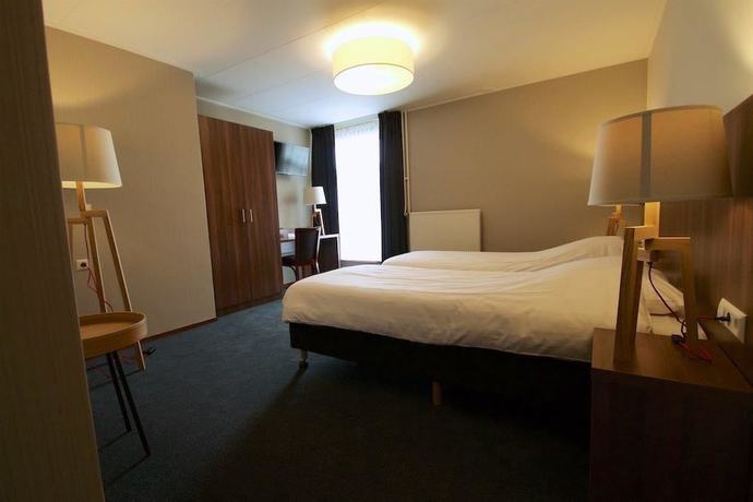 Imagen de la habitación del Hotel de Roode Leeuw. Foto 9