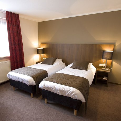 Imagen de la habitación del Hotel de Roode Leeuw. Foto 10