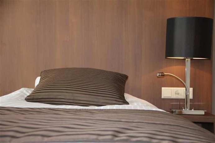 Imagen de la habitación del Hotel de Roode Leeuw. Foto 11