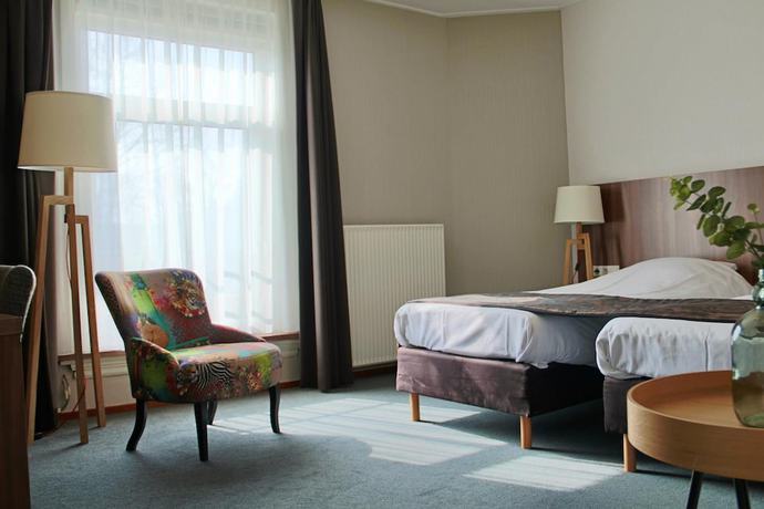 Imagen de la habitación del Hotel de Roode Leeuw. Foto 12