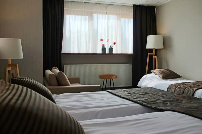 Imagen de la habitación del Hotel de Roode Leeuw. Foto 14