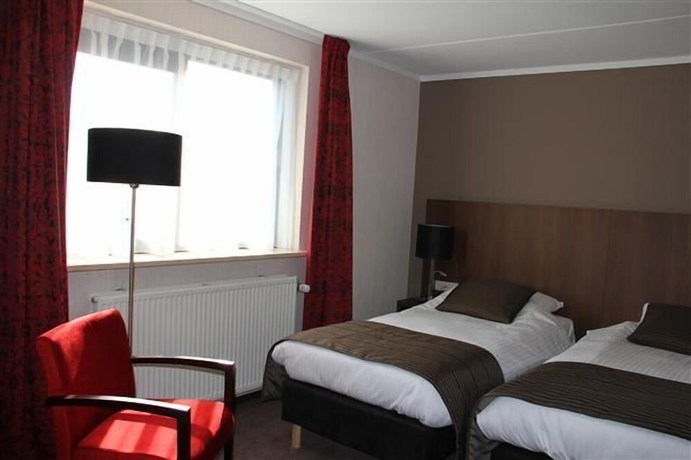 Imagen de la habitación del Hotel de Roode Leeuw. Foto 15