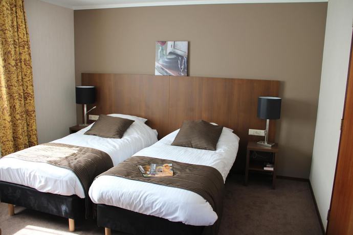 Imagen de la habitación del Hotel de Roode Leeuw. Foto 20