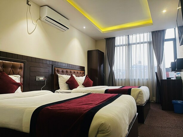 Imagen de la habitación del Hotel de Universal. Foto 18
