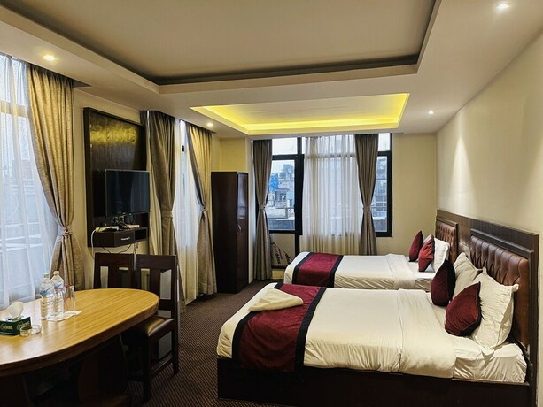 Imagen de la habitación del Hotel de Universal. Foto 19