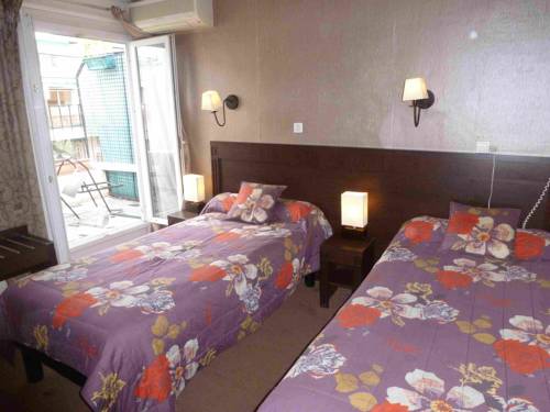 Imagen de la habitación del Hotel de Verdun. Foto 14