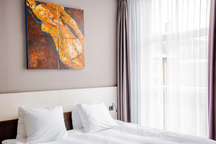 Imagen de la habitación del Hotel de Wereld. Foto 12