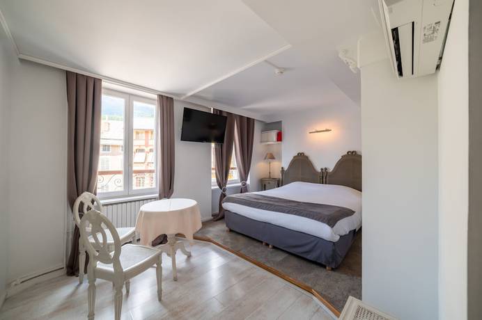 Imagen de la habitación del Hotel de la Mairie. Foto 17