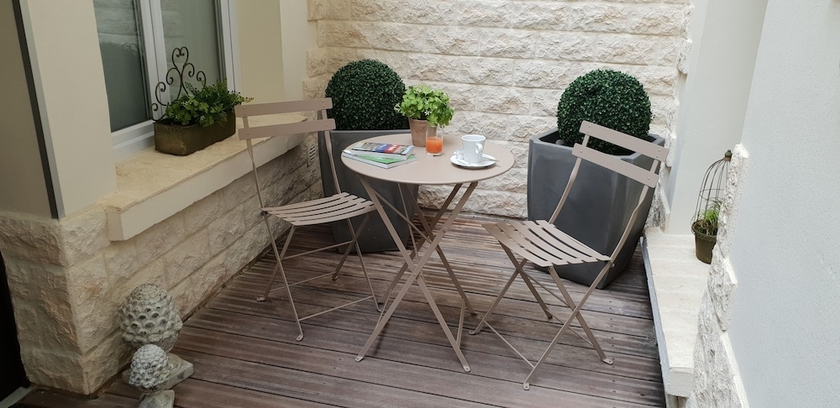 Imagen de la habitación del Hotel de la Paix, París. Foto 10