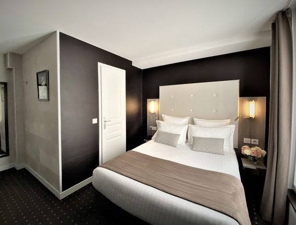 Imagen de la habitación del Hotel de la Paix, Torre Eiffel. Foto 4