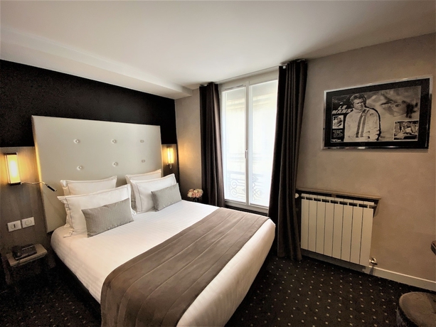 Imagen de la habitación del Hotel de la Paix, Torre Eiffel. Foto 6