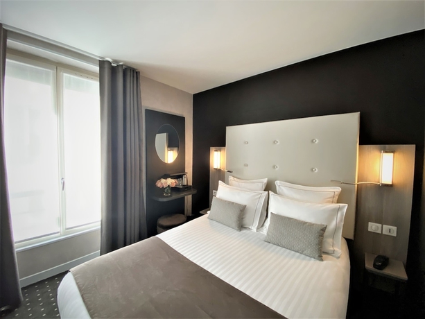 Imagen de la habitación del Hotel de la Paix, Torre Eiffel. Foto 7