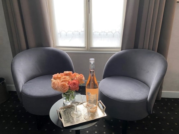 Imagen de la habitación del Hotel de la Paix, Torre Eiffel. Foto 8