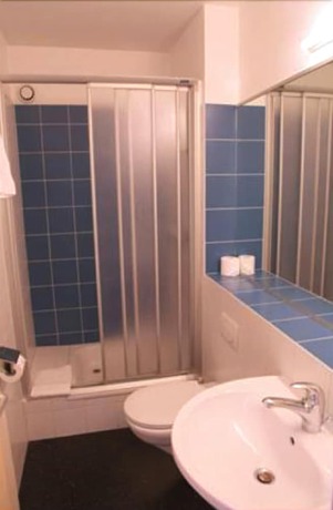 Imagen de la habitación del Hotel de la Poste, MARTIGNY. Foto 6