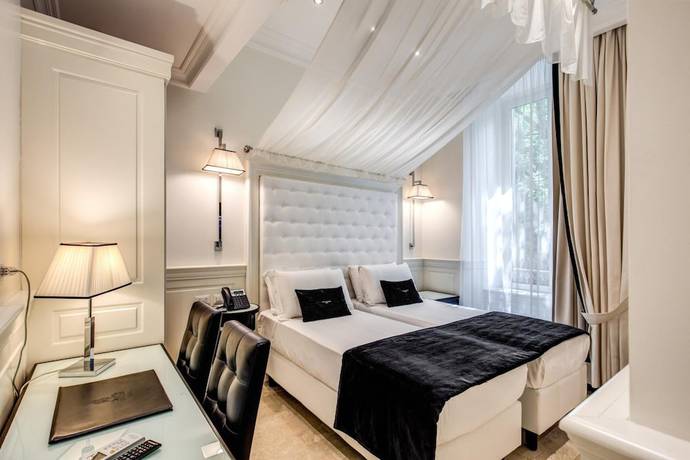 Imagen de la habitación del Hotel dei Quiriti Suite. Foto 4