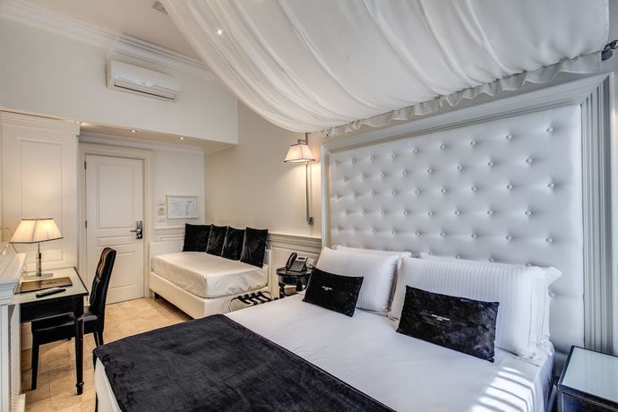 Imagen de la habitación del Hotel dei Quiriti Suite. Foto 7
