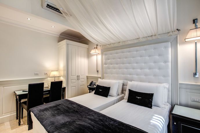 Imagen de la habitación del Hotel dei Quiriti Suite. Foto 8