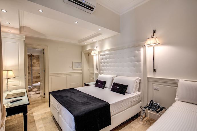 Imagen de la habitación del Hotel dei Quiriti Suite. Foto 9