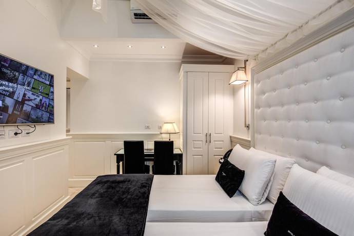 Imagen de la habitación del Hotel dei Quiriti Suite. Foto 11