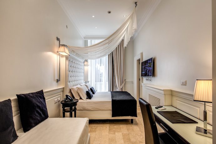 Imagen de la habitación del Hotel dei Quiriti Suite. Foto 12