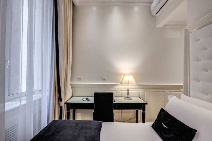 Imagen de la habitación del Hotel dei Quiriti Suite. Foto 14