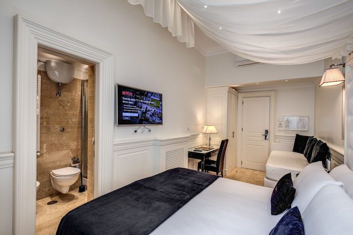 Imagen de la habitación del Hotel dei Quiriti Suite. Foto 16