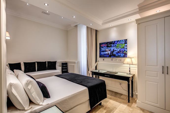 Imagen de la habitación del Hotel dei Quiriti Suite. Foto 18
