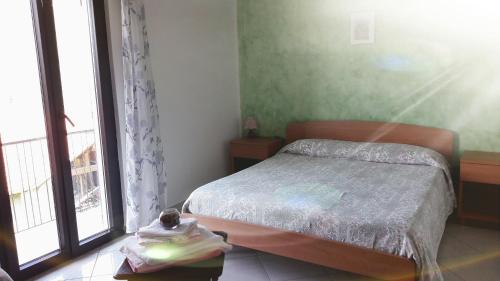 Imagen de la habitación del Hotel del Falco, Livo. Foto 10