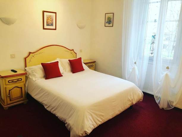 Imagen de la habitación del Hotel des Colonnes. Foto 6