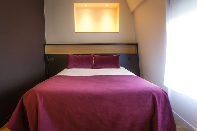 Imagen de la habitación del Hotel des Halles. Foto 5