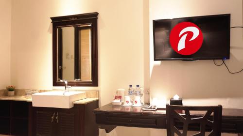 Imagen de la habitación del Hotel d\'primahotel Pattimura Makassar. Foto 13