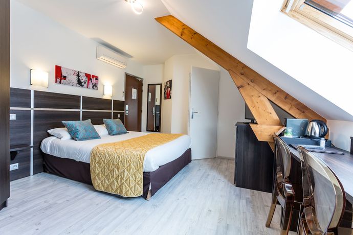 Imagen de la habitación del Hotel du Centre, Gramat. Foto 7