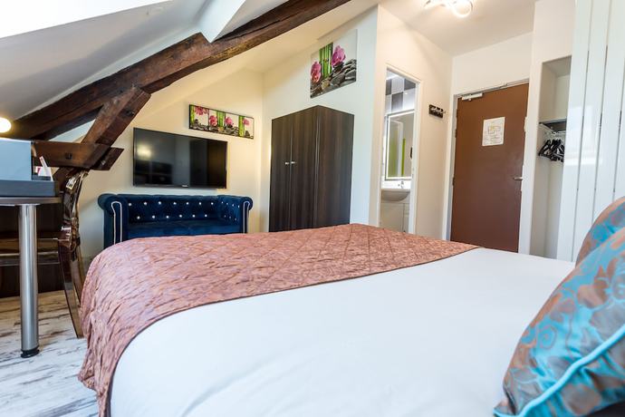 Imagen de la habitación del Hotel du Centre, Gramat. Foto 13