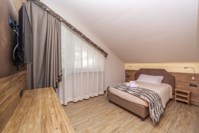 Imagen de la habitación del Hotel du Col. Foto 16