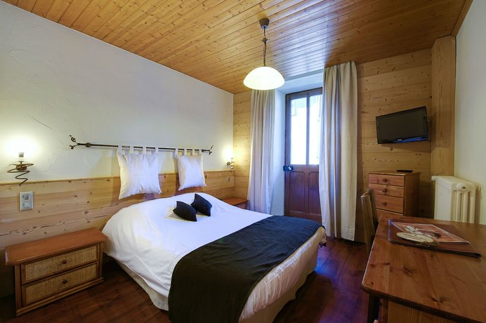 Imagen de la habitación del Hotel du Commerce, Le Turban. Foto 11