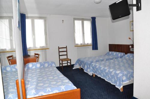 Imagen de la habitación del Hotel du Commerce et de Navarre. Foto 5