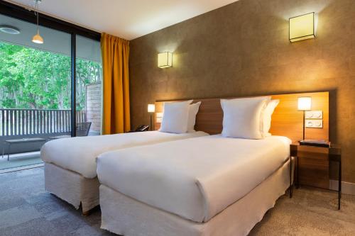 Imagen de la habitación del Hotel du Golf, Pont Royal. Foto 17