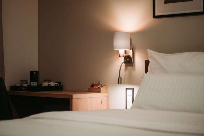 Imagen de la habitación del Hotel du Midi, Del&eacute;mont. Foto 12