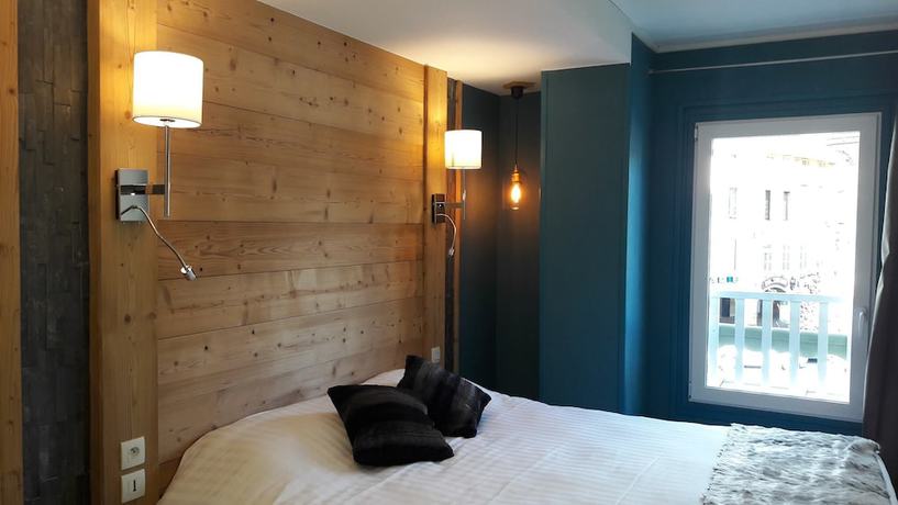 Imagen de la habitación del Hotel du Midi, Th&ocirc;nes. Foto 3