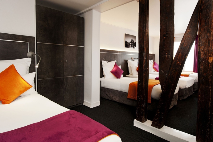 Imagen de la habitación del Hotel du Plat d'Etain. Foto 5