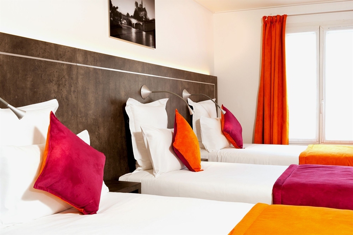 Imagen de la habitación del Hotel du Plat d'Etain. Foto 6