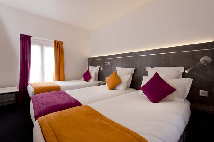 Imagen de la habitación del Hotel du Plat d'Etain. Foto 7